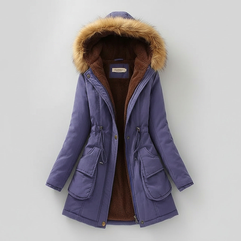 Purple winter coat with fur hood on a light beige background