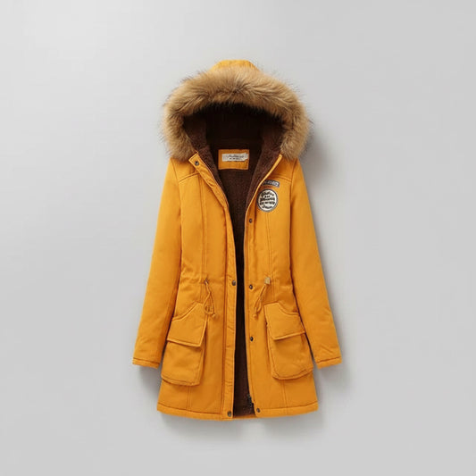 Yellow winter coat with fur hood on a light background