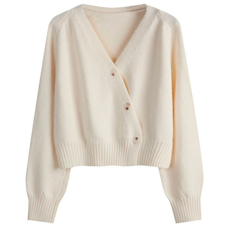 Beige cardigan on a white background